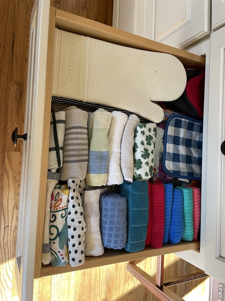 Neatly organized kitchen towel drawer