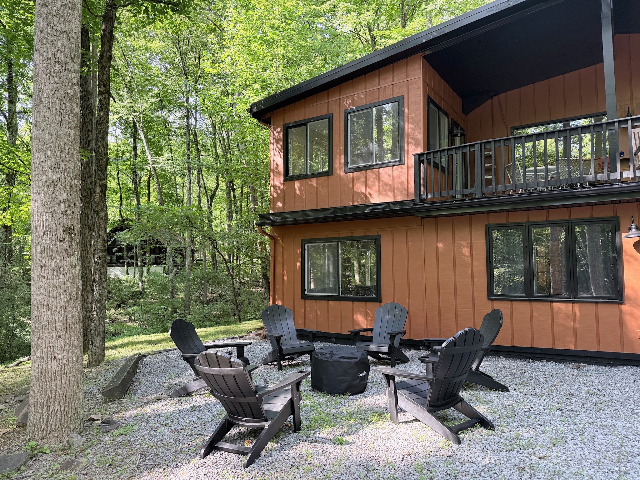 Fire pit gathering area outside the cabin